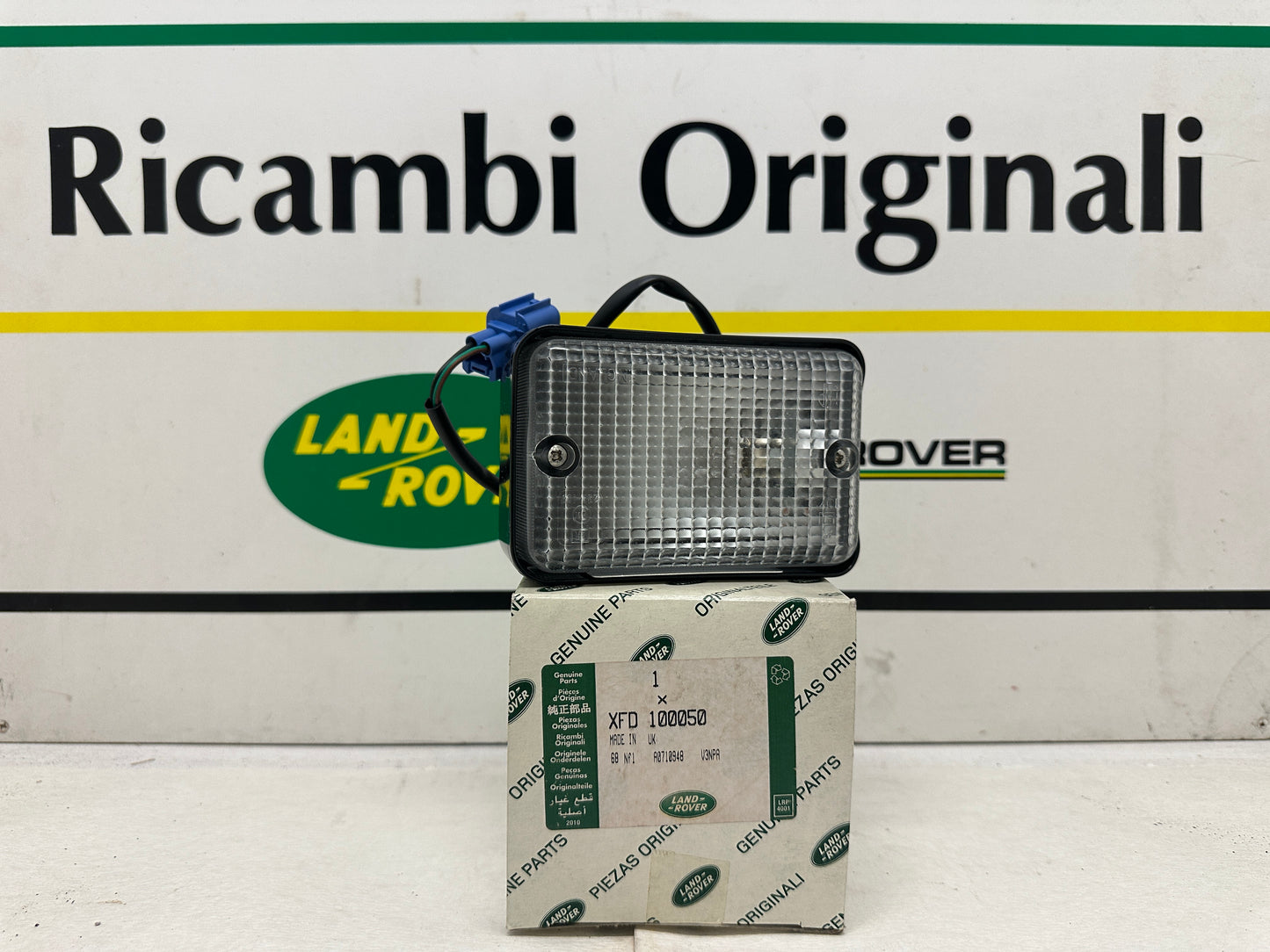 Lampada Retromarcia Land Rover Defender TD5 Primo Tipo Cod. XFD100050